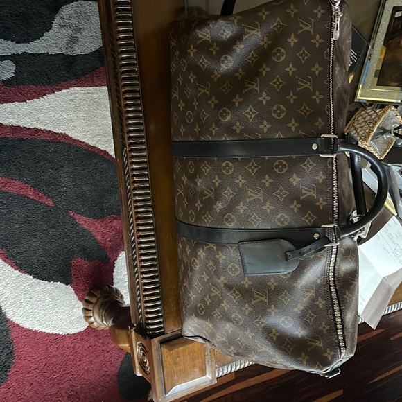 Authentic Louis Vuttion keep all 56 - Picture 1 of 2